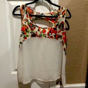 White Sleeveless Top with Floral Pattern